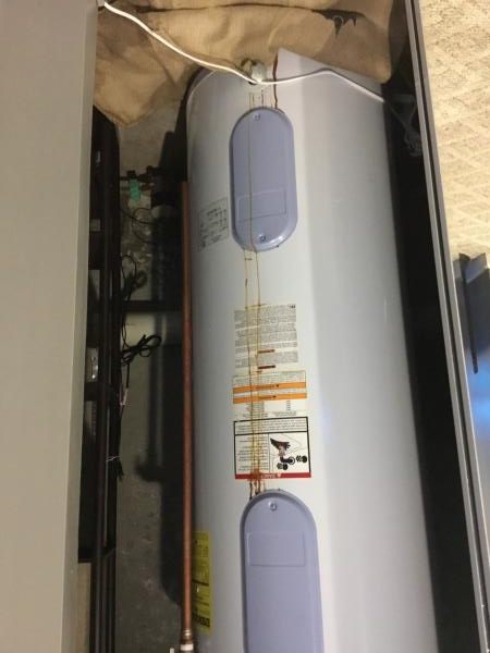 Electric Water Heater Leaking from Side Panel: Quick Fixes!