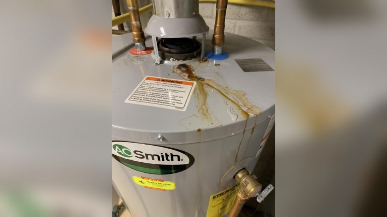 Gas Water Heater Leaking from Top